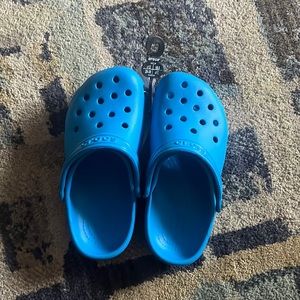 Crocs my son never wore! I found in the back of the closet. Brand new!